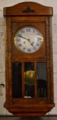 Oak case 1930's wall clock with chiming mechanism