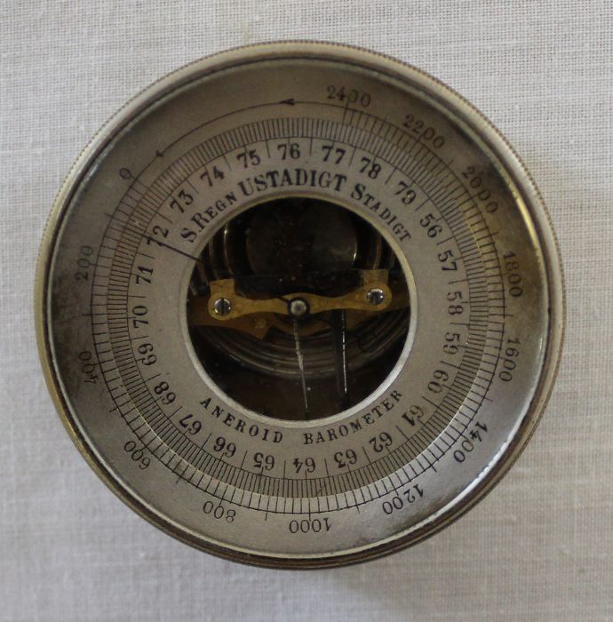 Pocket Continental aneroid barometer with rotating bezel & altitude markers
