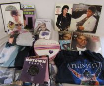 Collection of memorabilia relating to Justin Bieber and Michael Jackson inc LPs, clothing, mug etc