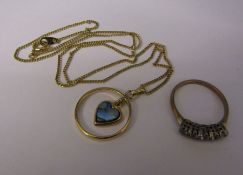 9ct gold ring with paste stones weight 2.1 g size O/P and a gold plated necklace and pendant