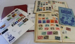 2 small albums of World stamps and a selection of First Day Covers