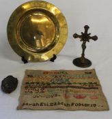 Brass plate with incised heron decoration, brass crucifix, small Victorian sampler & brass door