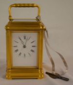 19th century French carriage clock in a gilded gorge case