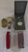 2 Swiss army pen knives, watches and a gold plated sovereign case