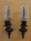 Pair of modern bronze wall sconces with crackle glass shades (one cracked)