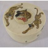 Early 20th century ivory trinket pot with tiger decoration D 6.5 cm H 3.5 cm (base plate needs
