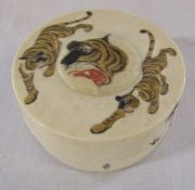 Early 20th century ivory trinket pot with tiger decoration D 6.5 cm H 3.5 cm (base plate needs