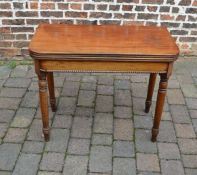 William IV / Early Victorian fold over mahogany tea table on turned legs