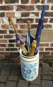 Ceramic umbrella stand with assorted umbrellas