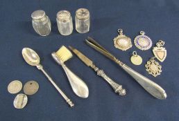 A collection of Silver/white metal items to include 4x fobs, silver topped condiment set etc