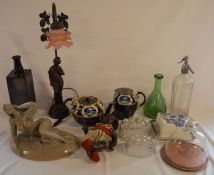 Cheese dishes, soda siphon, jelly moulds, figure of a nude, lamp etc
