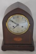 Edwardian arch top mantel clock in an mahogany case Ht 32cm