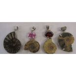 4 gemstone and fossil pendants H 6 and 5.5 cm, total weight 2.80 ozt