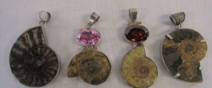 4 gemstone and fossil pendants H 6 and 5.5 cm, total weight 2.80 ozt