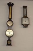 2 aneroid barometers