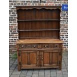 Carved oak dresser H 177 cm L 131 cm D 48 cm