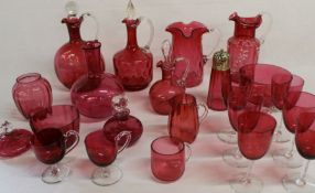 Selection of cranberry glass including decanters, jugs & set of 6 wine glasses etc.