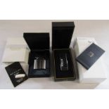 Boxed Dunhill Rollagas black resin D pattern lighter and a Ronson nostalgia lighter