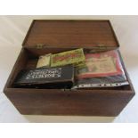 Large wooden box containing assorted vintage toys