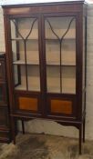 Edwardian display cabinet on tapering legs with inlay & painted decoration Ht 172cm W 92cm D 31cm