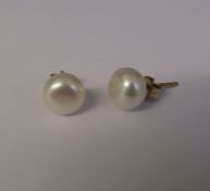 Pair of 9ct gold natural pearl set earrings D 8 mm