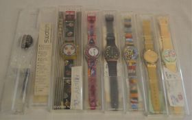 6 ex-shop stock Swatch wristwatches (one not working) + 2 additional boxes