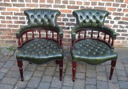 Pair of reproduction leather button back captain's chairs