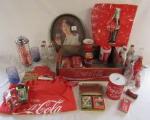 Various memorabilia relating to Coca-cola inc tray, glasses, playing cards, money boxes, box and