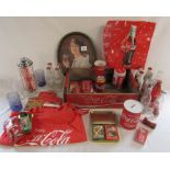 Various memorabilia relating to Coca-cola inc tray, glasses, playing cards, money boxes, box and