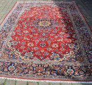 Fine woven full pile red ground Persian Najafabad carpet 337cm by 240cm