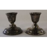 Pair of small silver candlesticks with weighted bases Birmingham 1922