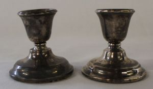 Pair of small silver candlesticks with weighted bases Birmingham 1922