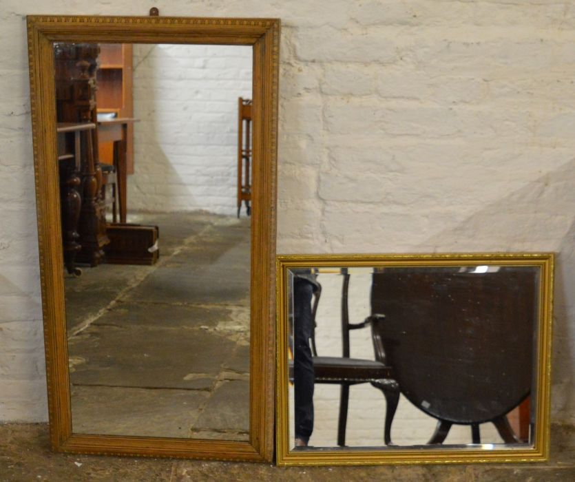 2 wall mirrors. Largest 105cm by 55cm