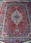 Rich red ground full pile cashmere traditional carpet with medallion 195cm by 135cm