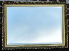Gilt framed wall mirror 83cm by 60cm