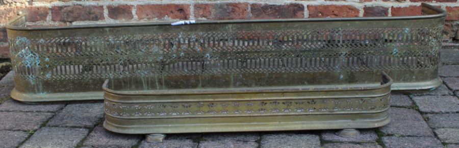 Two nineteenth century pierced brass fenders / fire curbs width 81cm / 146.5cm