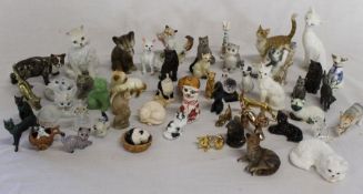 Mixed selection of ornamental cats - porcelain, china, brass