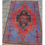 Full pile hand woven Afghan Baluchi rug 138cm by 86cm