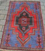 Full pile hand woven Afghan Baluchi rug 138cm by 86cm