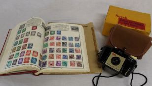 World stamp album & Kodak Brownie 127 camera with box & case