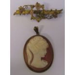 9ct gold forget me not brooch L 5 cm weight 2.3 g and a 9ct gold cameo pendant 3.5 cm x 2.5 cm total