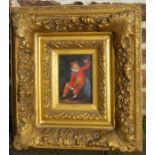 Oil on board of a boy in a heavy gilt frame 49cm by 43cm