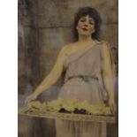 Large early 20th century crystoleum of a young lady in classical dress with a tray of flowers. Frame