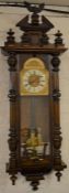 Ornate Gustav Becker Vienna wall clock with twin train weight driven mechanism & eagle pediment Ht
