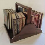 Wooden book trough with assorted books