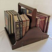 Wooden book trough with assorted books