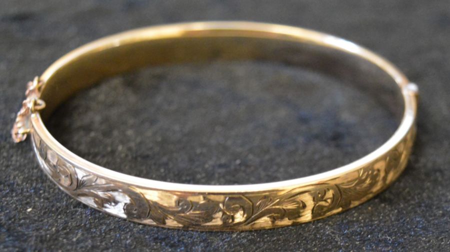 AMENDED DESCRIPTION 9ct gold plated bangle stamped 9ct metal core