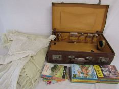 Suitcase with Ladybird books etc