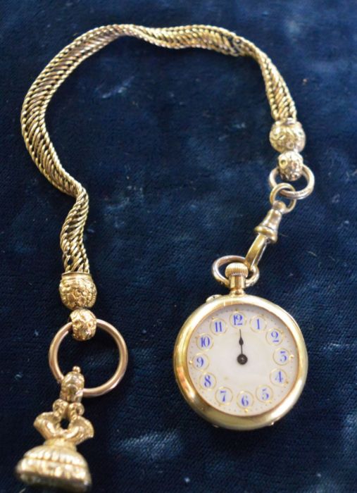 AMENDED DESCRIPTION Small gold fob watch marked 18K missing minute hand, total weight 27.4 g with