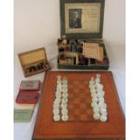 Ernest Sewell cabinet of conjuring tricks (af), chess set with pieces, travel chess set and a